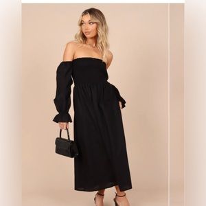 Gorgeous black off shoulder midi dress, sleeves attached. Two Pockets